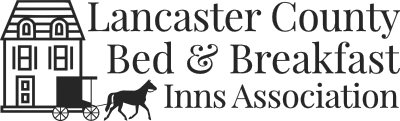 logo for Lancaster County Bed & Breakfast Inns Assocation; bed and breakfast home with passing buggy